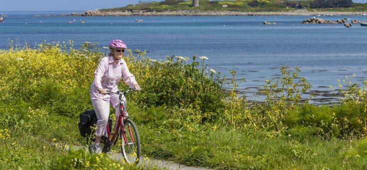 Guernsey lady on bike