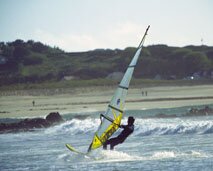 Windsurfing at Cobo Bay